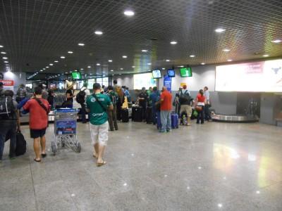 41 Different Places That I Have Watched World Cup 2014 So Far Arrival in Fortaleza - the wee screen beside the luggage belt is showing Iran v. Nigeria.