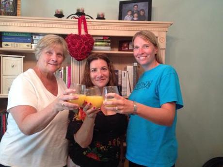 Chip (l), Leeanne (r) and me toasting our contract with Mimosas.