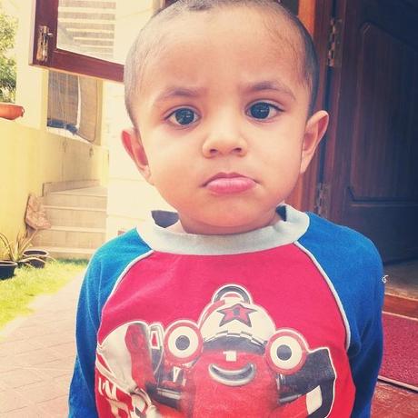 {Almost} Wordless Wednesday: Photographing the Piglet A ferocious scowl and a pout