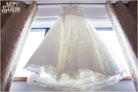 Wedding Dress hangs in the window