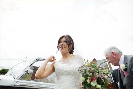 Bride smiles at escrick church wedding