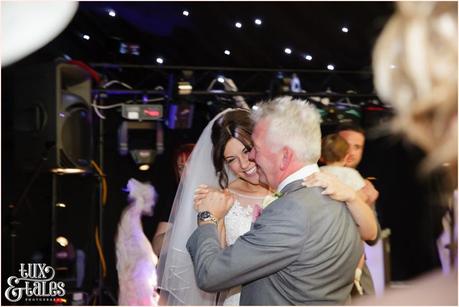 Bride and dad dance together at York wedding