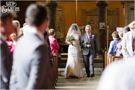 Bride walks up aisle at Escrick church wedding