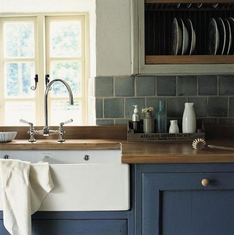 What a great undermounted, farm style sink when paired with the countertops and cabinet styles.