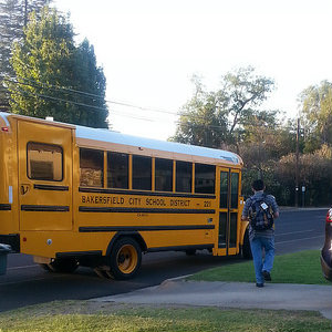 On the first day back to school, Samuel jumped onto the bus with a spring in his step!
