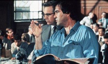 Oliver Stone conferring with Costner