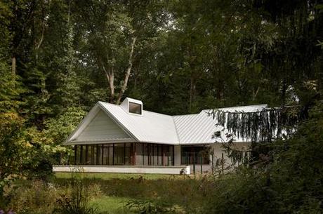 The Harbert Cottage with a gabled white roof in Michigan