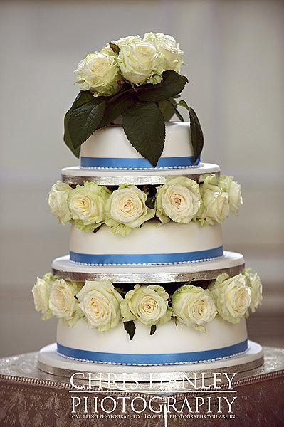 Wedding cake - simply lovely in blue and white with palest cream roses