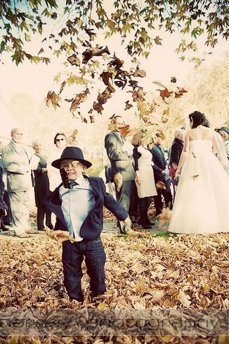 I love this photo! The coolest guest at the wedding lets his hair down and kicks a few leaves...