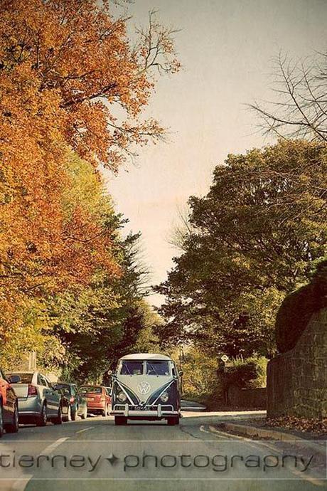 The bride arrives in a vintage vw campervan - love it!