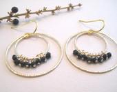 Double hoops with black garnet earrings