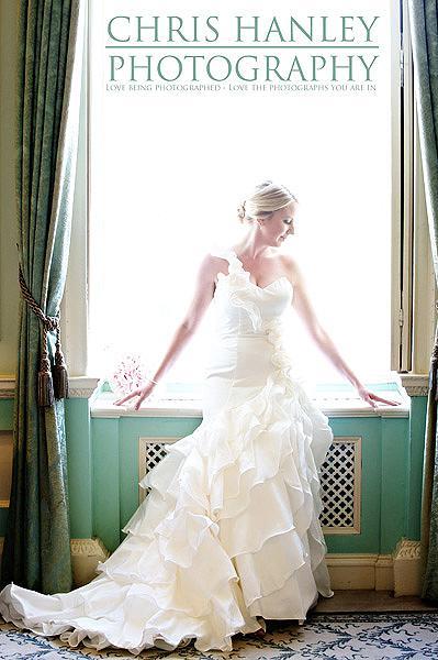 I adore this photograph of Amy on her wedding day: bathed in sunlight, so very elegant and with that wonderful dress - fit for a princess