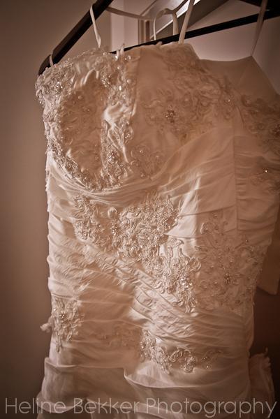 ... and the wedding dress, covered in flower patterns, pearls and twinkling crystals