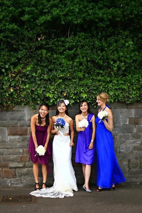 Viv and her bridesmaids in shades of purple