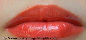 Givenchy Gloss Interdit Ultra-Shiny Plumping Effect in Succulent Orange: brings memories of an exotic summer