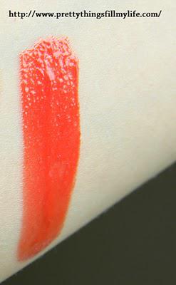 Givenchy Gloss Interdit Ultra-Shiny Plumping Effect in Succulent Orange: brings memories of an exotic summer