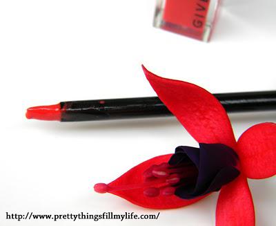 Givenchy Gloss Interdit Ultra-Shiny Plumping Effect in Succulent Orange: brings memories of an exotic summer