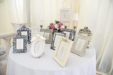 wedding blog photograph of vintage style photo frame table plan