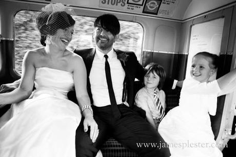 A big red London bus takes everyone to the reception