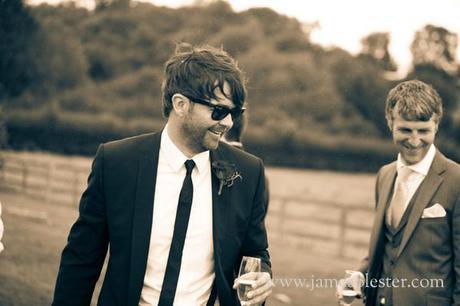 Our super cool groom enjoys some champers