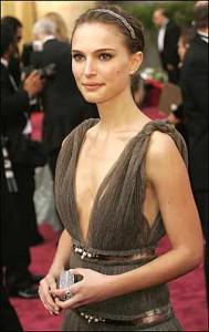 natalite portman wearing a plunging neckline dress