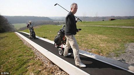 Travelator Transporting Golfers