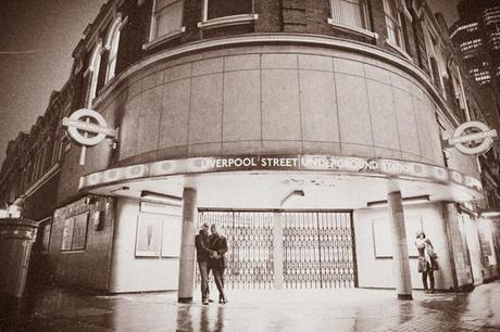 I love this quiet, bright, grainy shot outside the tube station at night