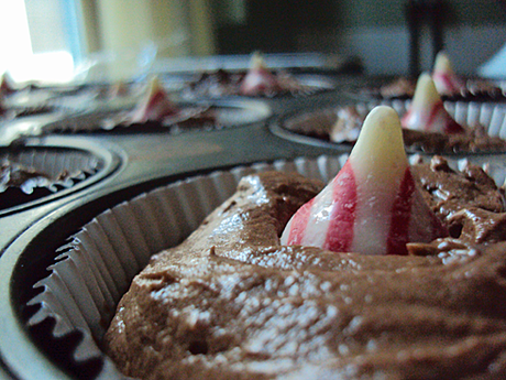 Chocolate candy cane cupcake with white chocolate frosting