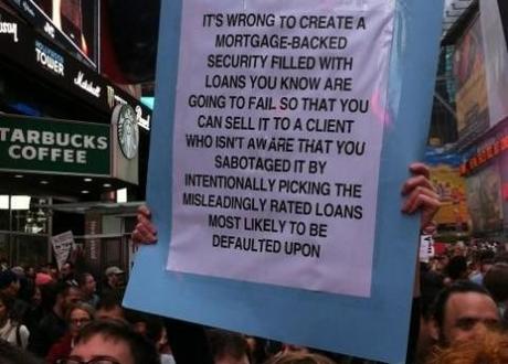 From Arab Spring to Occupy, the seven punchiest protest signs of 2011