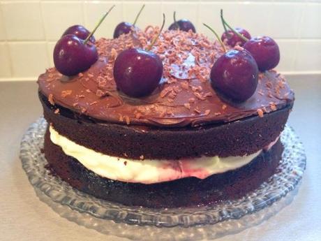 assembled recipe black forest cake fresh cherries and rich chocolate cream filled