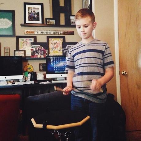 our son with autism practicing the snare drum