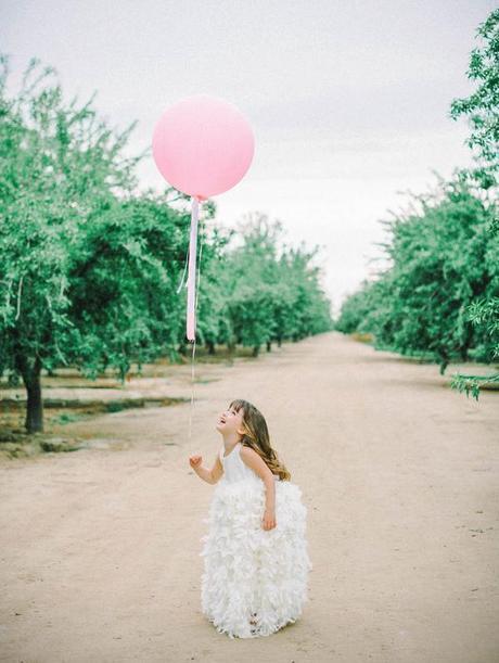 Ruffled feather flower girl dress