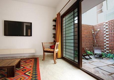 Bangalore, India house living room interior with sliding glass door