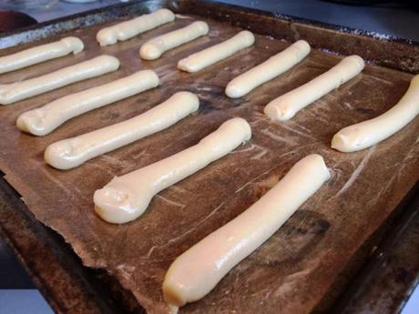 piping choux pastry eclair lines gbbo