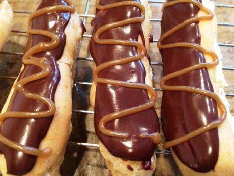 chocolate and caramel eclairs piped swirl shiny icing gbbo