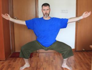 Goddess pose with hands in Chin mudra.