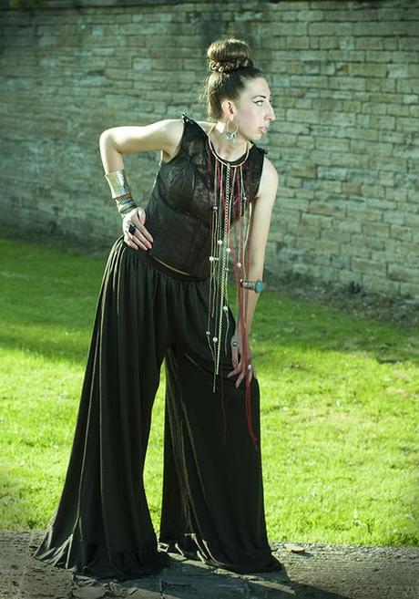 Top: Metallic & black leather with lace-up back & shoulders with pleated trousers & gold beaded necklace. Outfit inspired by Gustav Klimt paintings designed and made by LLM

xoxo LLM