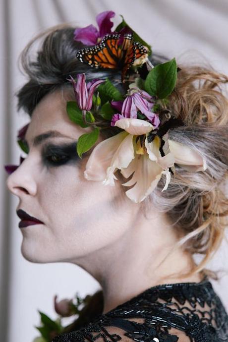 flowers and butterflies in hair.