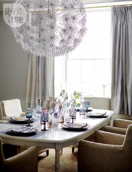 huge modern chandelier in dining room
