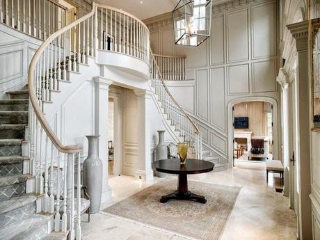 huge traditional white foyer wall paneling