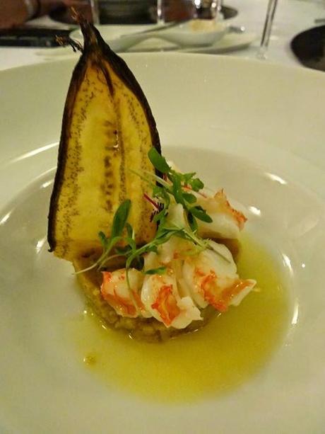 Buttery lobster on a plantain cake