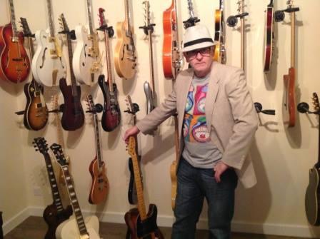 Cousin Silas with a few of his guitars.