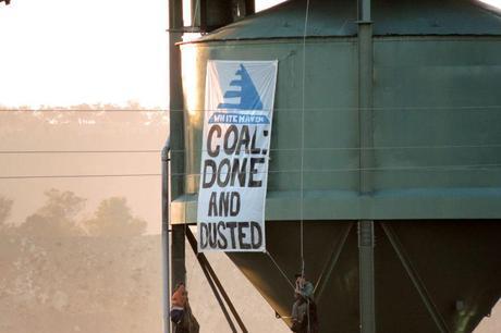 Two protesters scaled a coal loader and dropped a banner at Whitehaven's Werris Creek mine. (photo courtesy Leard Forest Alliance)