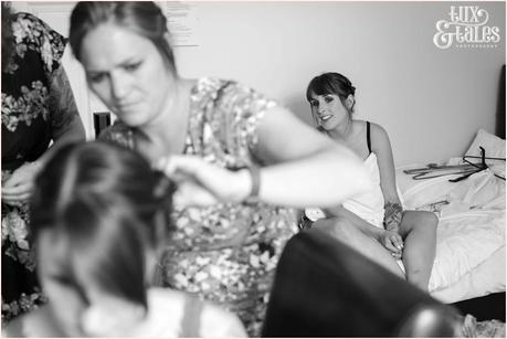 Wedding Photography at The Orangery Wakefield | Tattooed Bride | Bride Preparation | Tux & Tales Photography | friend watches as bride has hair styled