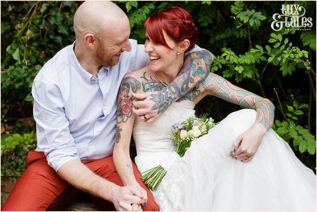 Wedding Photography at The Orangery Wakefield | Tattooed Bride | Couples portraits | Tux & Tales Photography | bride and groom smiling and laughing