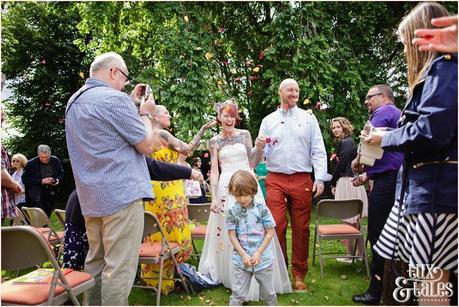 Wedding Photography at The Orangery Wakefield | Tattooed Bride | Outside ceremony | Tux & Tales Photography | walking back up aise confetti