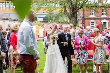 Wedding Photography at The Orangery Wakefield | Tattooed Bride | Outside ceremony | Tux & Tales Photography |  Bride walks with father