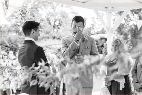 Outside Ceremony in Gazebo | Sheene Mill Wedding Photographer | Same Sex Wedding | Two Grooms | Tux & Tales Photography | Groom wipes away tear