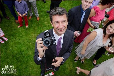 Guests Having Fun | Sheene Mill Wedding Photographer | Same Sex Wedding | Two Grooms | Tux & Tales Photography | Uncle Bob with Camera