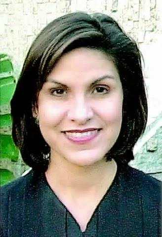 U.S. District Judge Tosses Out Texas' Voter ID Law